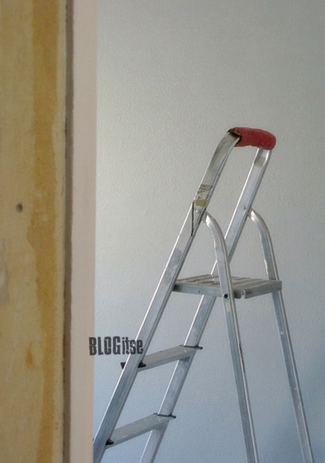 grey wall and a ladder by BLOGitse