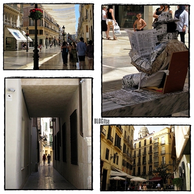 shopping or reading a newspaper in Calle Larios Malaga by BLOGitse